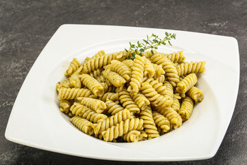 Italian pasta Fusilli with pesto