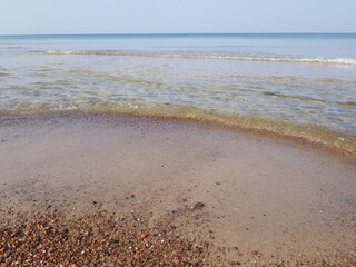 Sandy coast of the blue sea