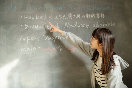 Young Female Teacher at Platform