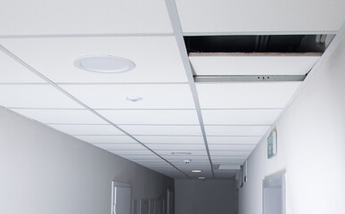 in the long corridor, the suspended ceiling plate is open, there is a place for the inscription