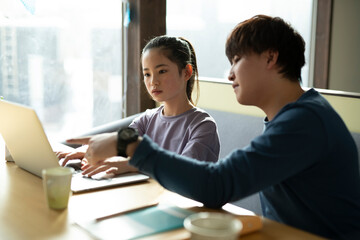 Girl and Tutor Learning with PC