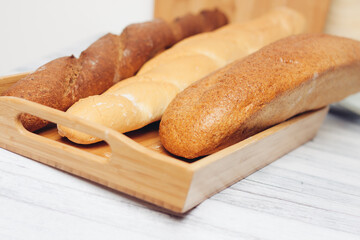 fresh loaf bread bins on the table kitchen food ration 