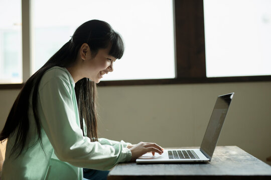 Girl Learning with PC