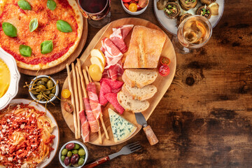 Italian food, a flat lay of a selection of dishes, shot from the top