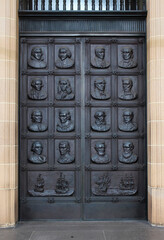 Bronze portico doors of the State library of NSW. The doors feature portraits of historic European explorers of Australia