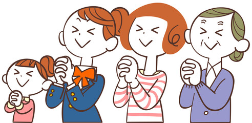 目を瞑って祈る様々な年代の女性たち
