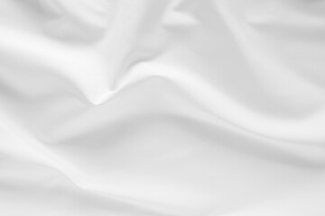 Abstract white fabric texture background. Cloth soft wave. Creases of satin, silk, and cotton.
