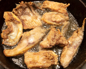 The fish is fried in oil