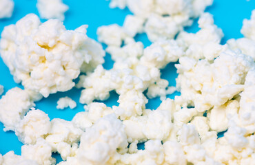 Milk curd on a blue background.