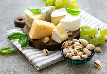 Various types of cheese and snacks