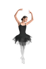 Fototapeta premium Beautiful young ballerina on white background