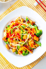 sweet and sour chicken with rice and vegetables