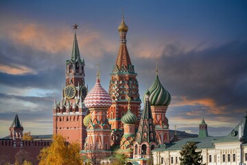Fototapeta premium St. Basil’s Cathedral and Spassky Tower on Red Square in Moscow. Orthodox church and architectural masterpieces of Moscow. Most famous sights of Russia. Life before pandemic COVID-19