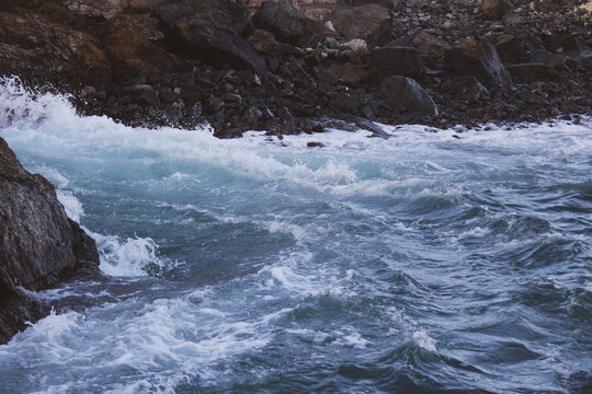 waves crashing on rocks