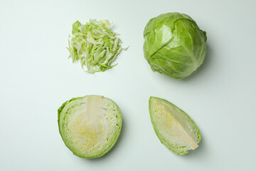 Flat lay with fresh cabbage on white background