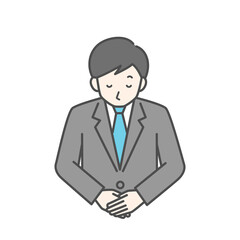 Obraz premium お辞儀をしているビジネスマン