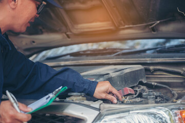 Mechanic car service auto garage in automotive mobile center. Technician workshop repair engine motor vehicles service mechanical engineering business. Automobile mechanic hands car repairs technic