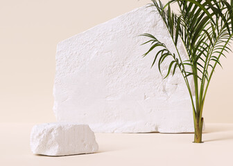 White stones podium product presentation, minimal scene with green tropical plant for product display, object placement mockup 3d rendering.