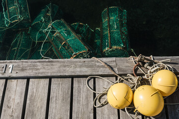 Lobster pots and yellow buoys