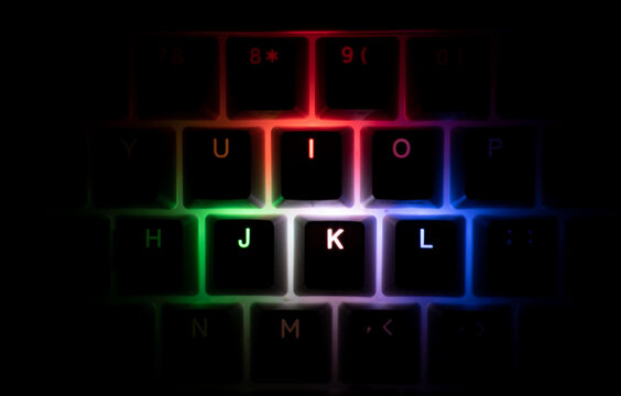 top view of illuminated RGB keycaps keys in the dark