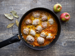 hot freshly made meatballs with vegetable sauce