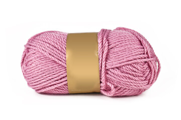 Ball of pink synthethic fibre wool isolated on white background