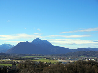 Panorama of the Austrian countryside near Salzburg ..
Plains and mountains on a sunny day.