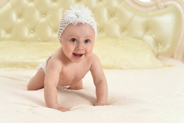 cute little baby girl on bed