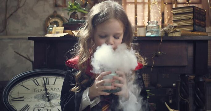 Little girl, student of the magic school blowing steam off a jar, fantasy 4k