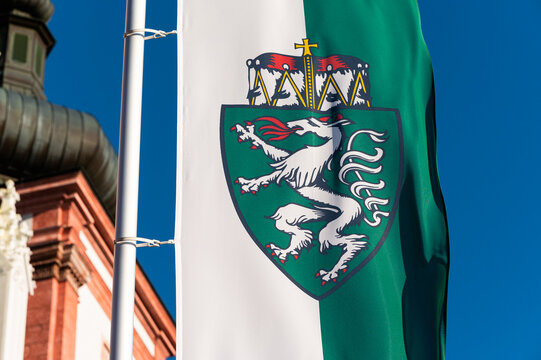 Flag of Styria in front of church in Mariazell