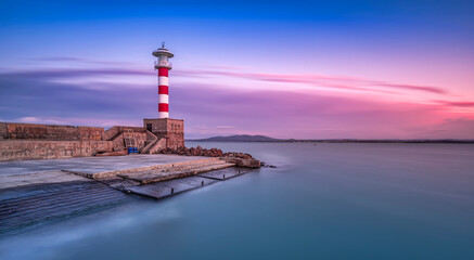 Obraz premium Bourgas effective lighthouse - located on the territory of the Port of Bourgas, located at the end of the eastern breakwater. Burned in 1899, this is the first Bulgarian port lighthouse.