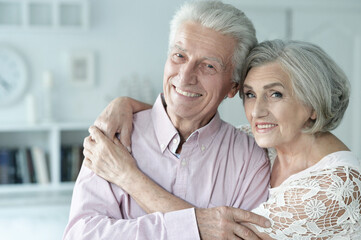 cheerful senior couple at home