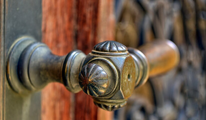 Old brass ornamental door handle 