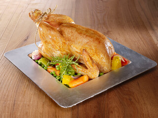 Roasted whole chicken and garnish
