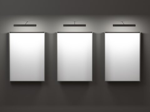 Triple empty frame on black wall