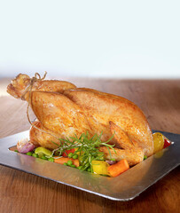 Roasted whole chicken and garnish
