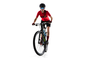 Professional female bike rider with road bike isolated over white background.