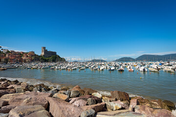 Fototapeta na wymiar Port of Lerici town with many boats, tourist resort on the cost of Gulf of La Spezia, Liguria, Italy, Southern Europe.