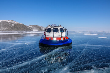 Hovercraft on Frozen Ice Surface. Baikal Lake in Winter