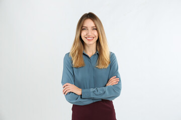 Obraz premium Portrait of beautiful young businesswoman on white background