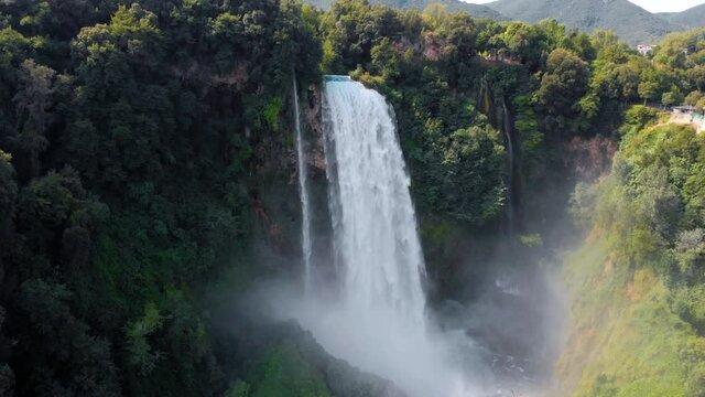 Aerial view. Water discharge, strong, maximum flow. Rainbow. The Cascata delle Marmore is a the largest man-made waterfall. Terni in Umbria Italy. Hydroelectric power plant