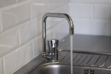 faucet with faucet in the kitchen close-up