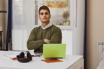 young businessman teleworking from home