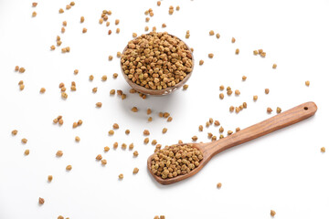 Dried chickpeas in bowl isolated on white background.