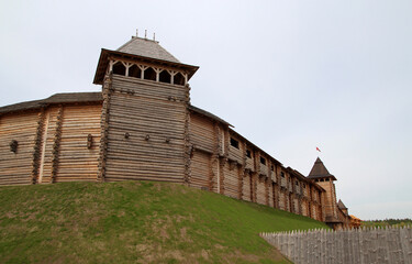 Russian defensive wooden walls of the ancient medieval fortress of Kievan Rus. Building of the old slavic citadel