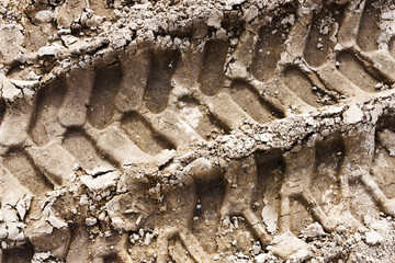Tyre mark background. Tire track shape. Trail lines on dry brown sand pattern. Road construction...