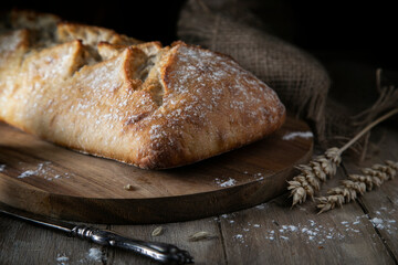 Fresh wheat bread on a rustic table