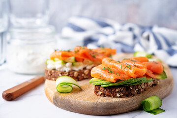 Smoked salmon ricotta cheese rye sandwich