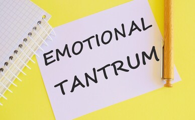 Word writing Emotional tantrum .Concept of emotional distress characterized by stubbornness, crying, screaming, violence, defiance, angry ranting, a resistance to attempts at pacification