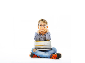 Preschooler with books ready for school